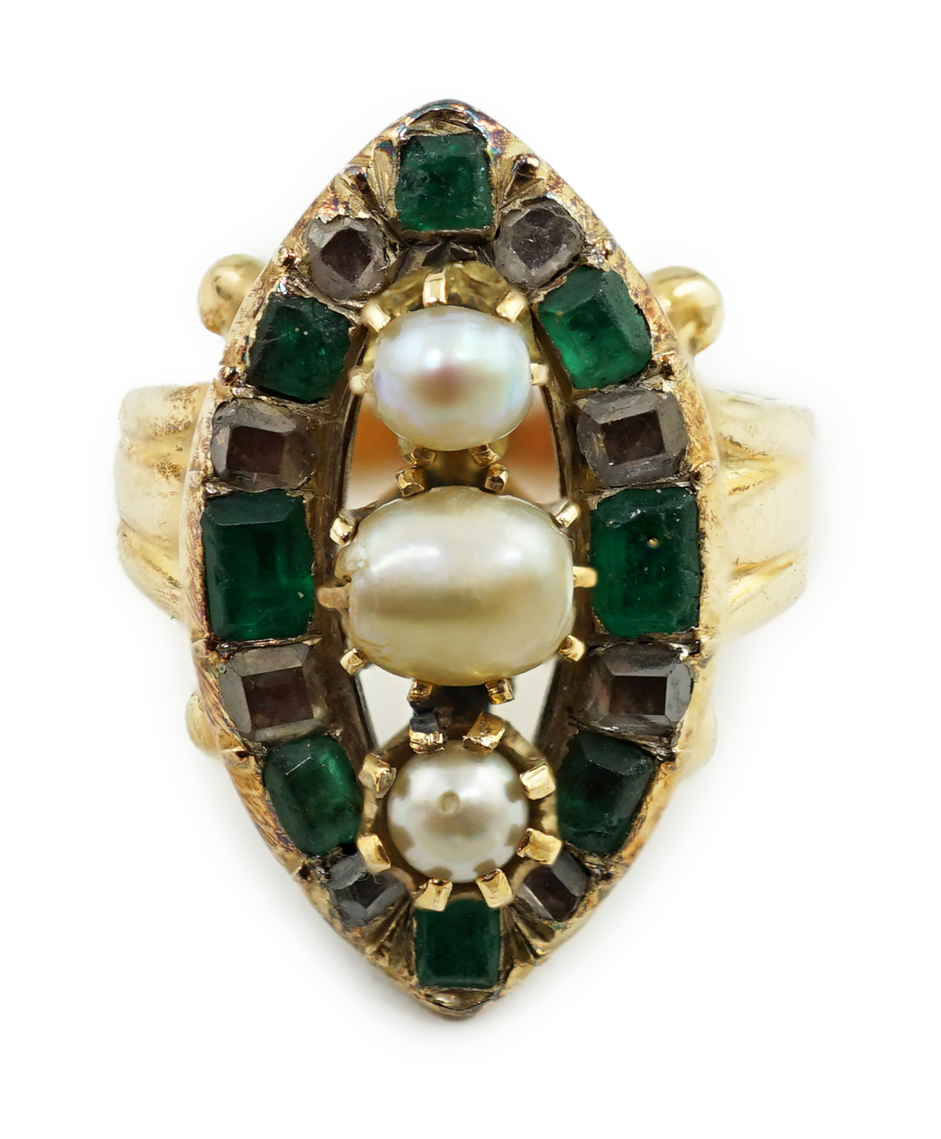 An antique gold, button pearl, emerald and diamond set navette shaped cluster ring